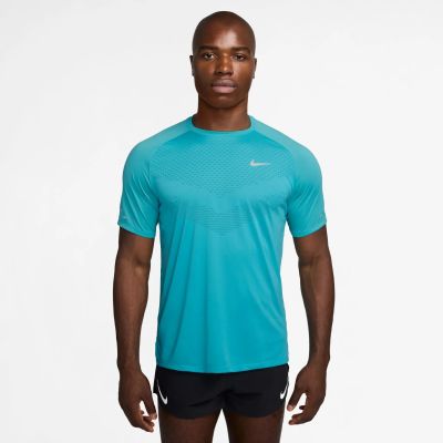M NK DFADV STRIDE SS TOP in 345 dusty cactus/reflective si